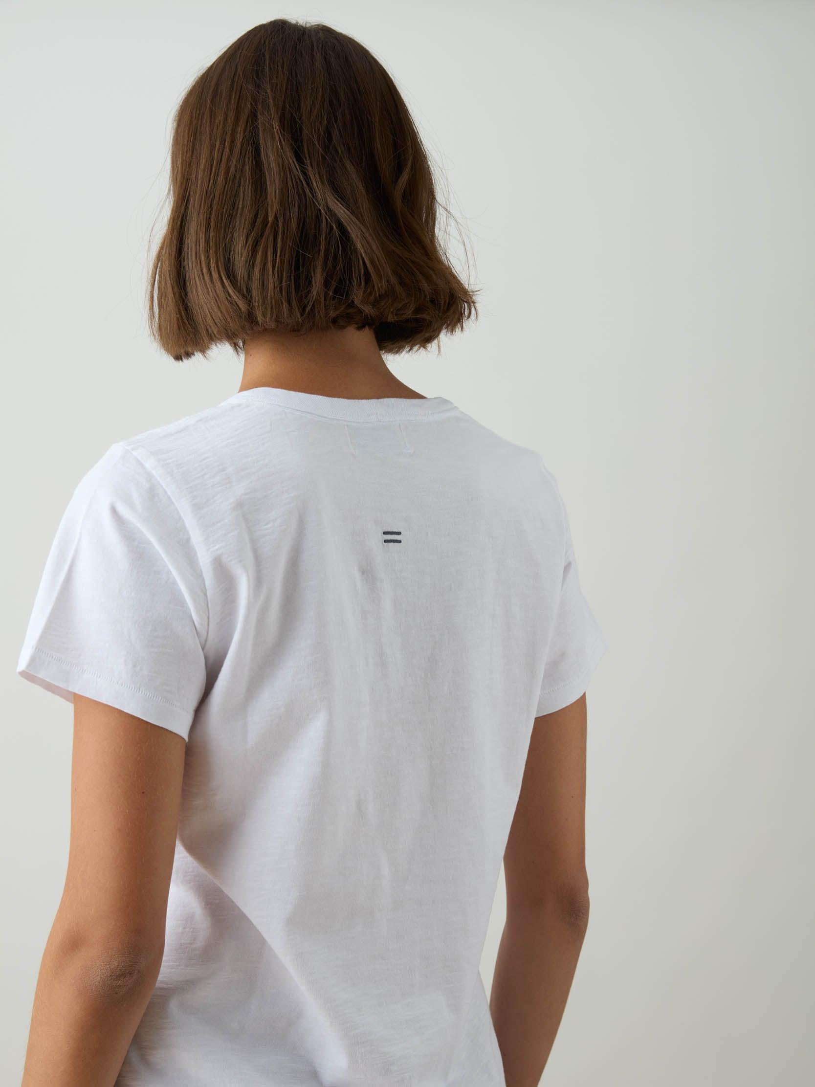 TAKEANAP organic cotton v-neck tee in white on a woman