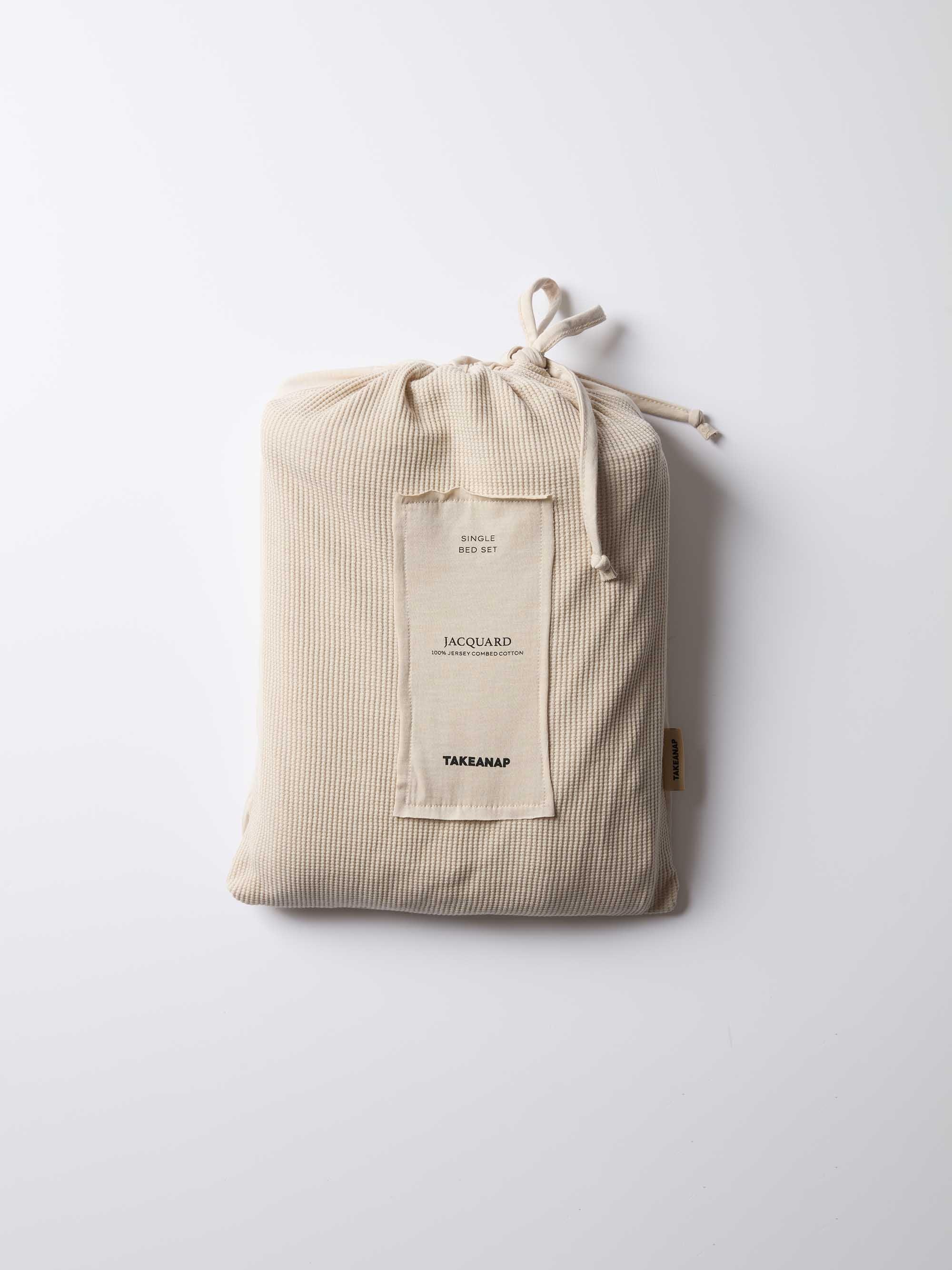 ציפה וציפיות טריקו Jacquard - אבן