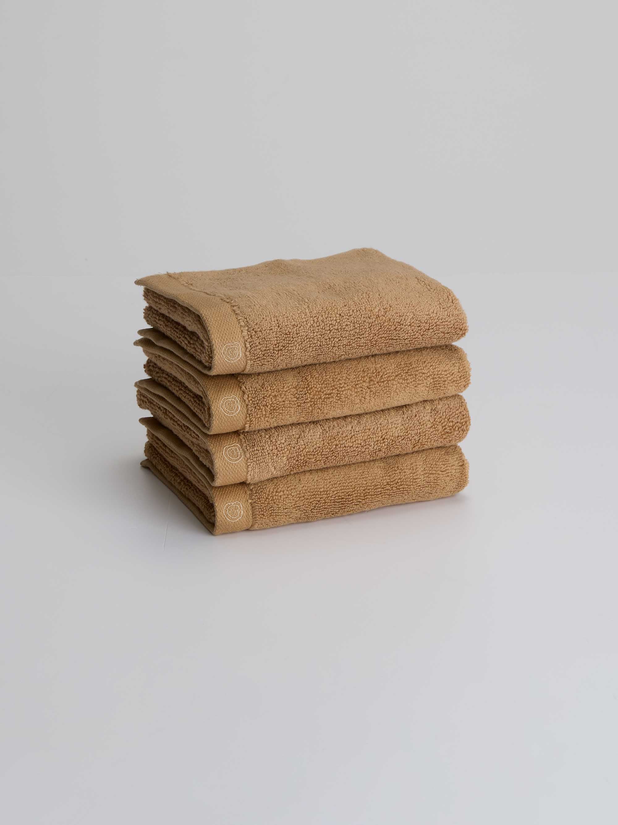 TAKEANAP bamboo zero-twist bath towel in blondy color on a shelf