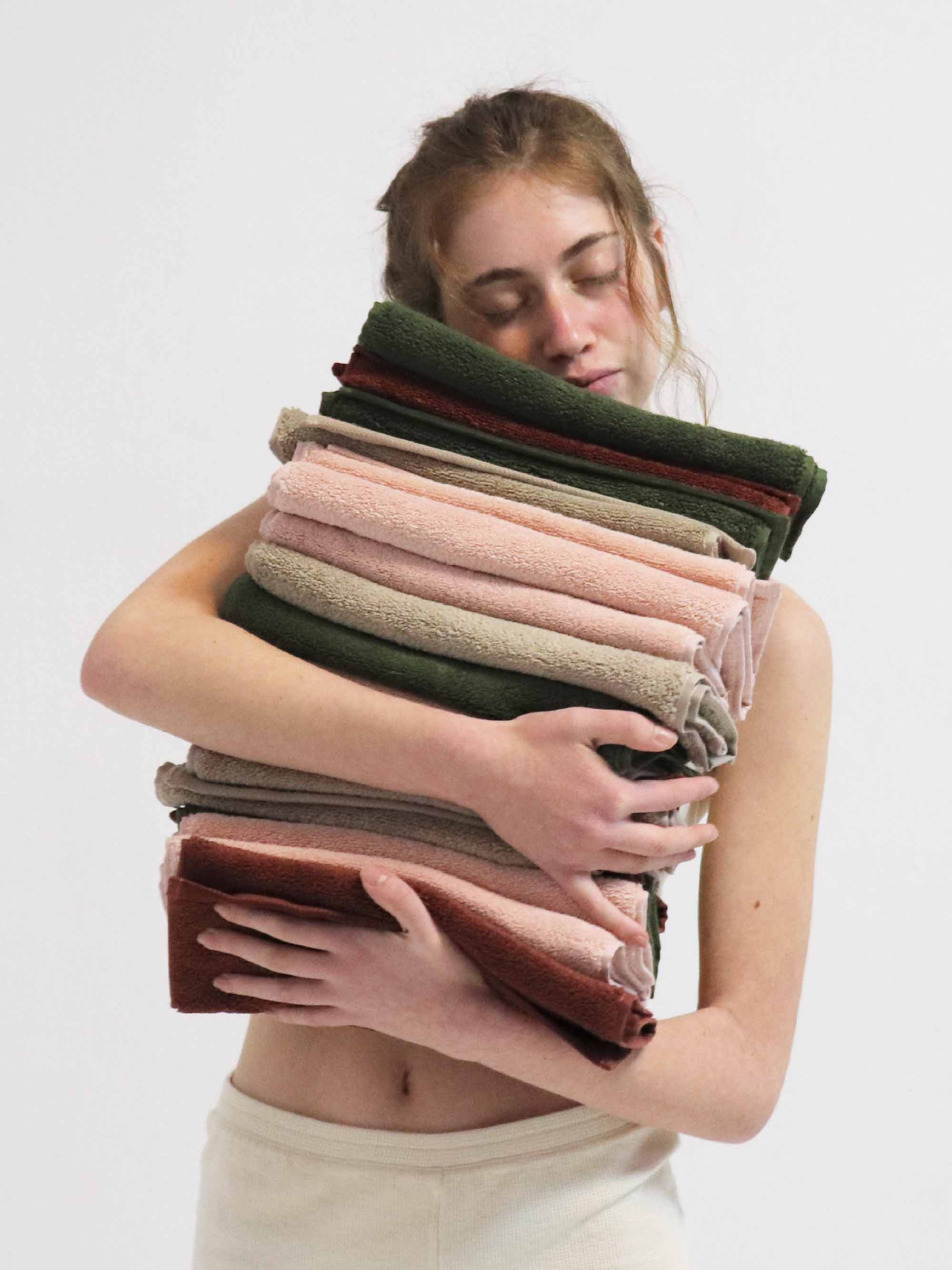 TAKEANAP 700 GSM bath towel in sand on a shelf