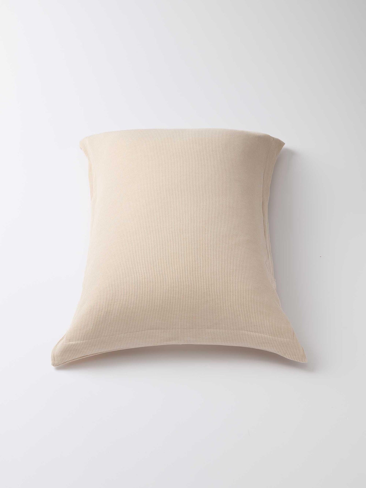 ציפית לכרית טריקו Jacquard - אבן